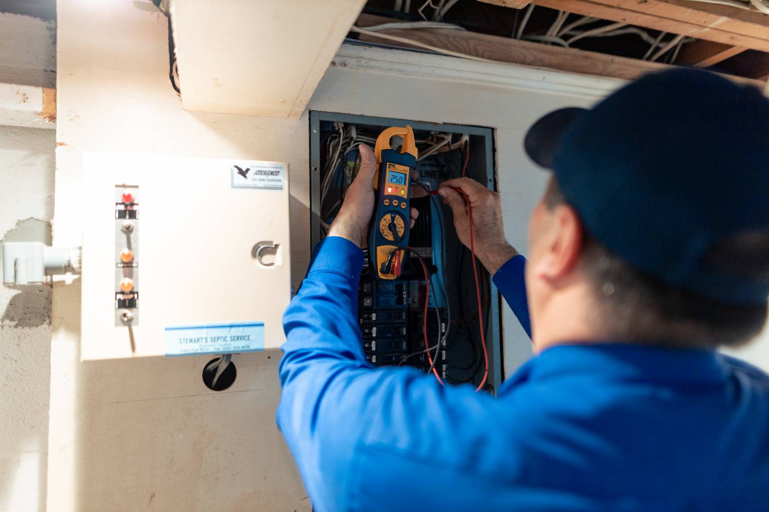 SECOS Tech doing regular electrical maintenance